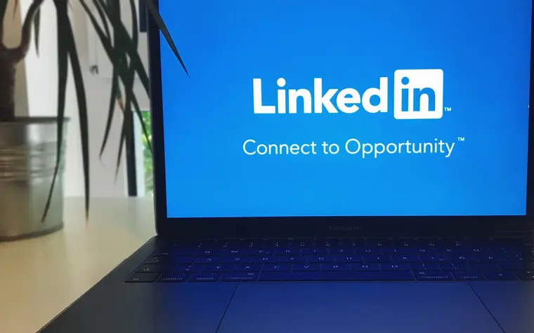 LinkedIn logo on a laptop screen.
