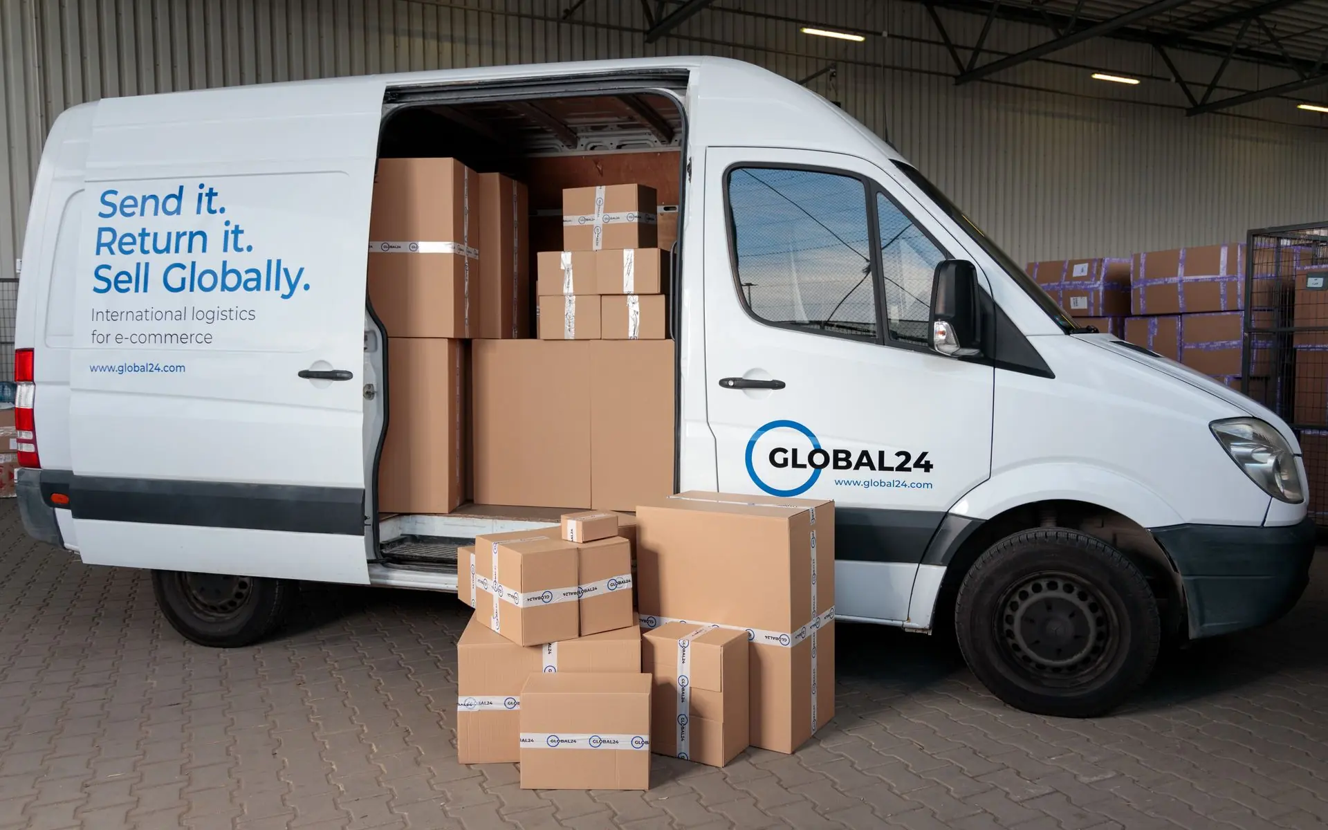 Warehouse worker handling returned parcels.