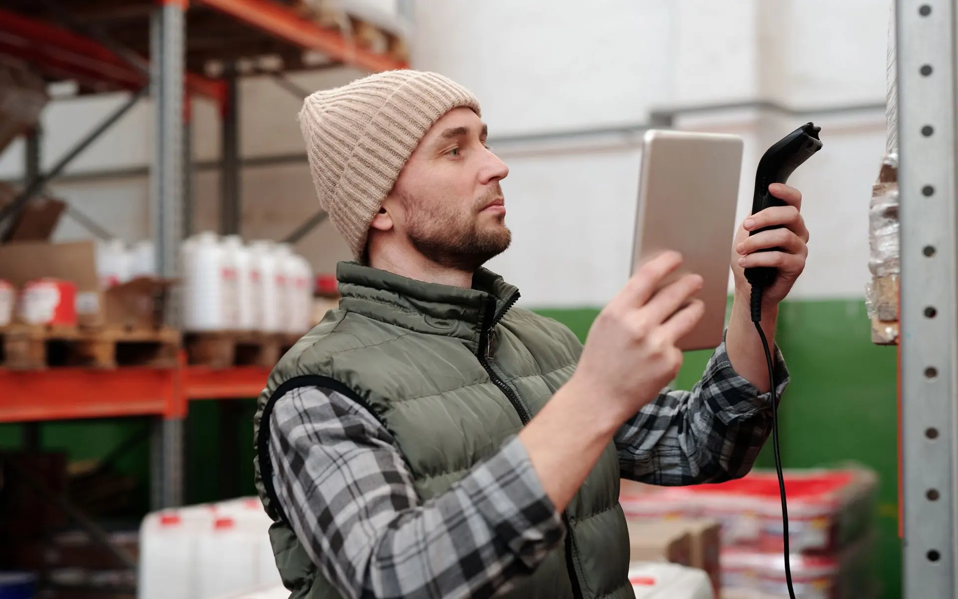 Warehouse worker using a tablet.