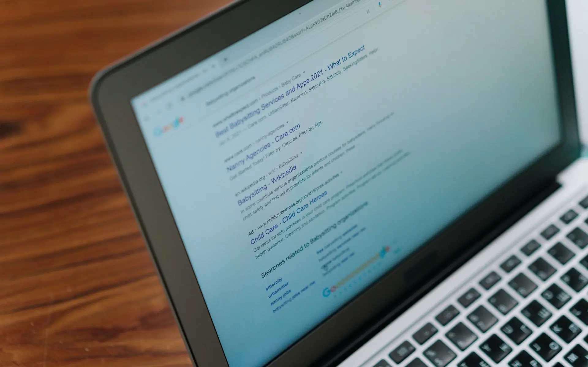 Google search results on a laptop screen.