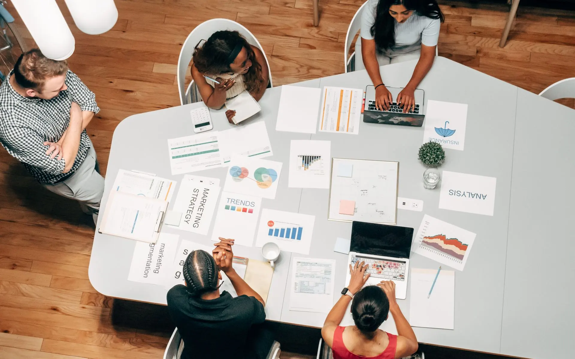 Team discussing a project in a bright office.