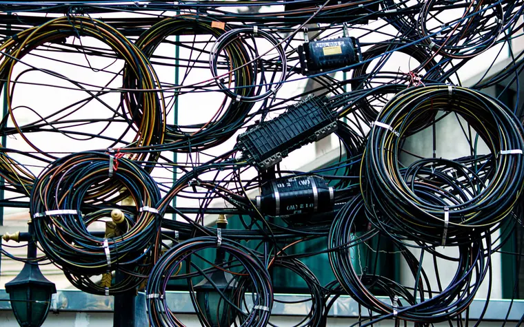 Bundle of tangled cables and wires.