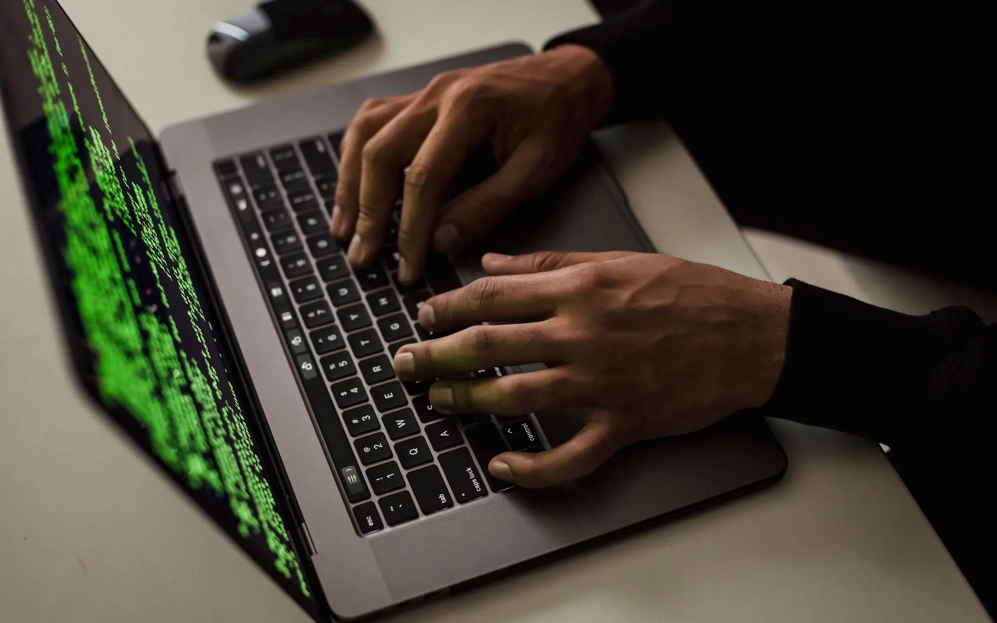 Person reviewing WordPress security information on a laptop.