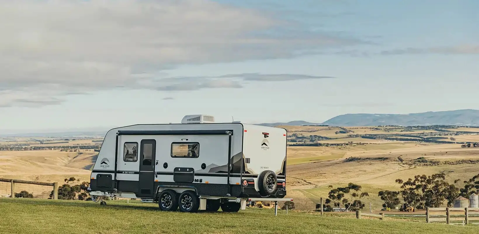 Snowy Caravans, snowy River caravan in a rural landscape.