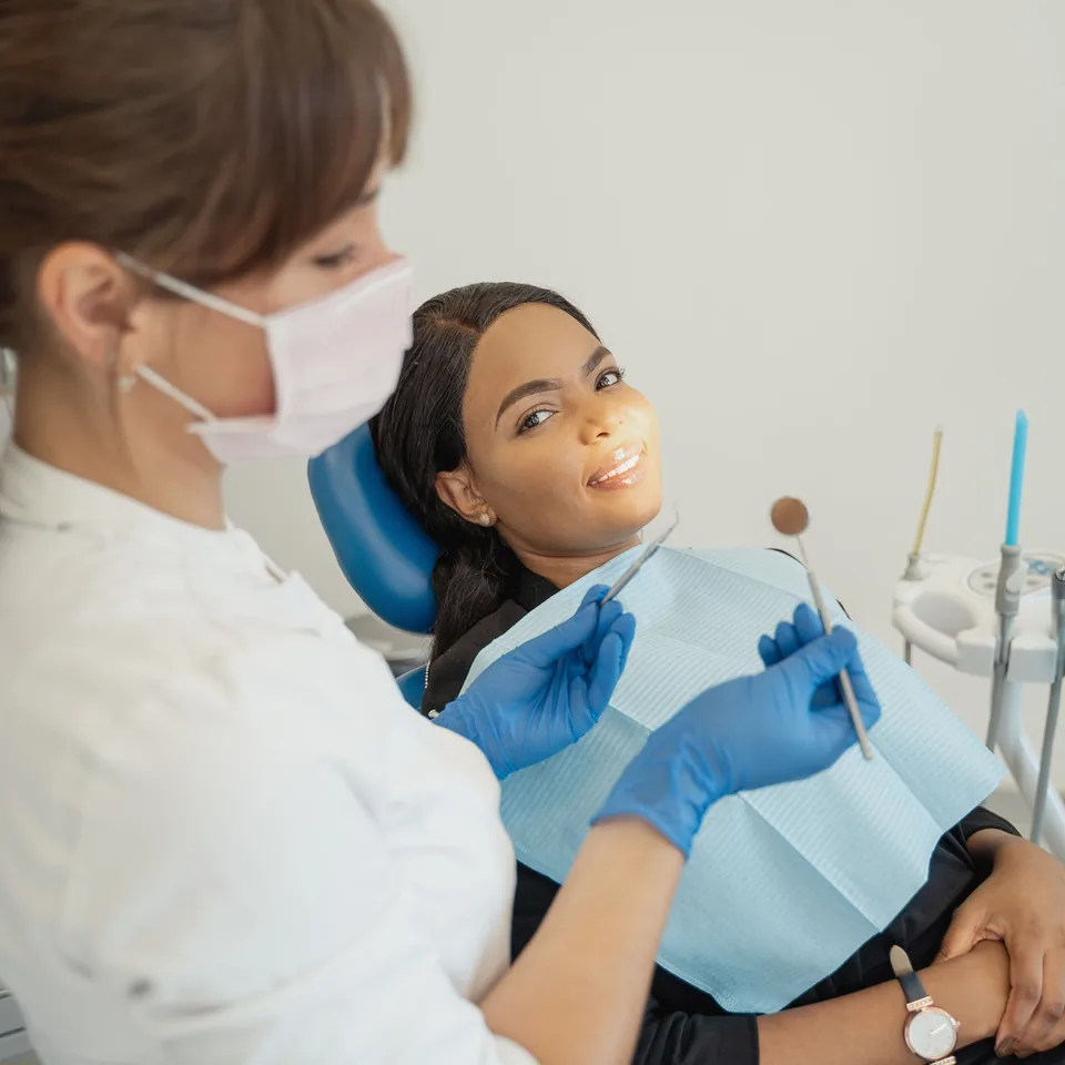 Dentist treating a child patient.