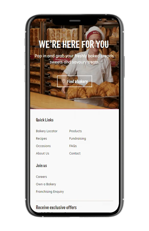 Bakers Delight location finder shown on a mobile phone.