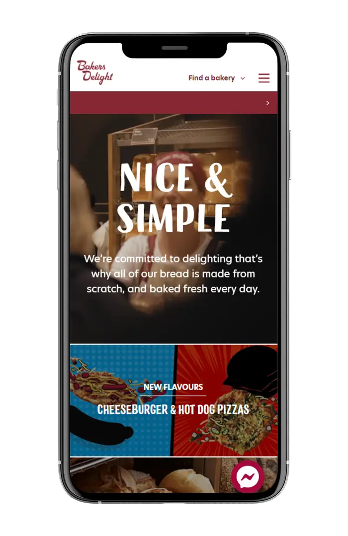 Bakers Delight website shown on a mobile phone.