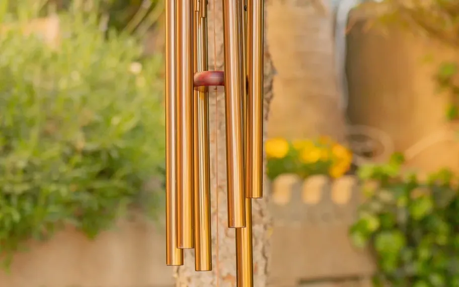 Wind chimes hanging outdoors.