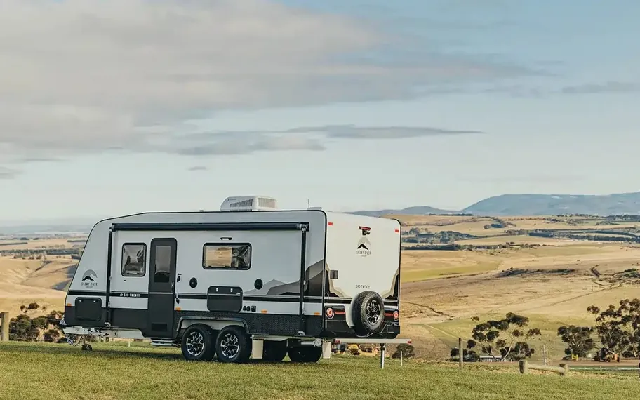 Snowy Caravans, snowy River caravan in a rural landscape.