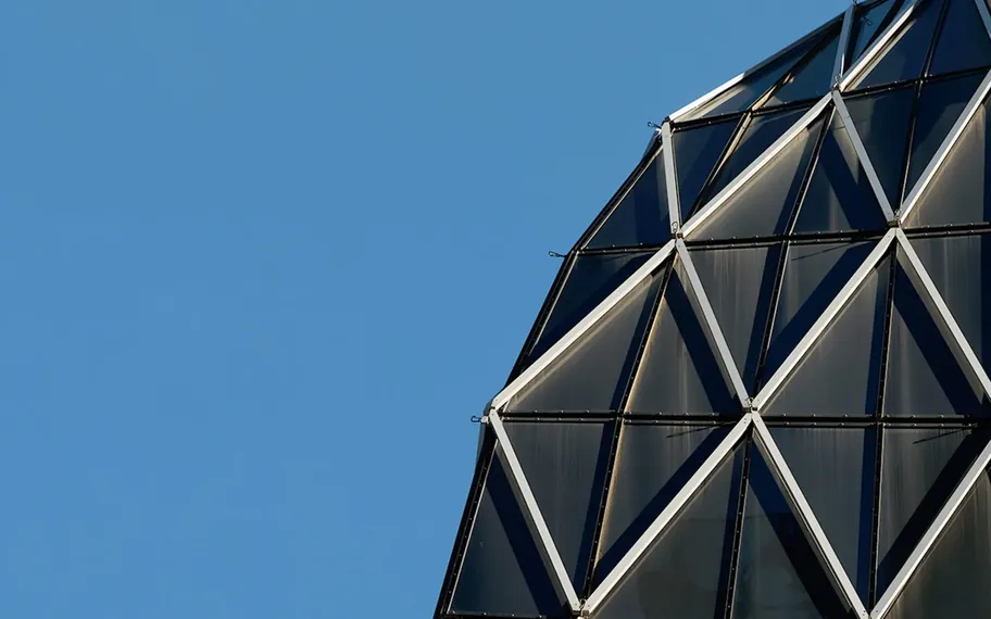 Maxcon Ink Hotel facade with geometric diagrid exterior.