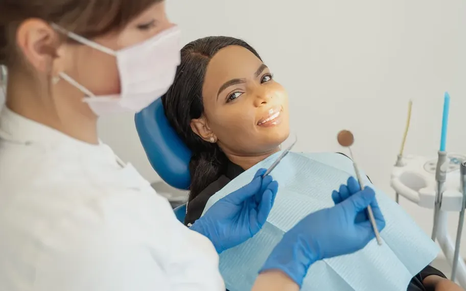 Dentist treating a child patient.