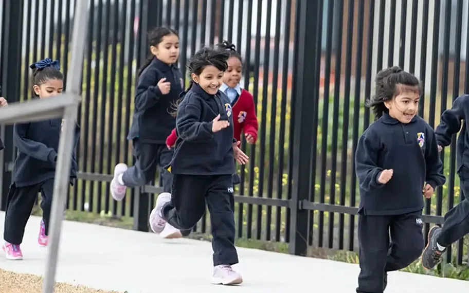 Hume Grammar students walking together in uniform.