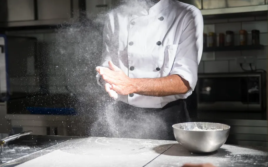 Bakers Delight baker at work.