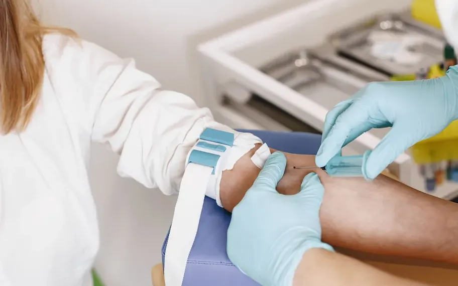 Healthcare professional administering an injection.