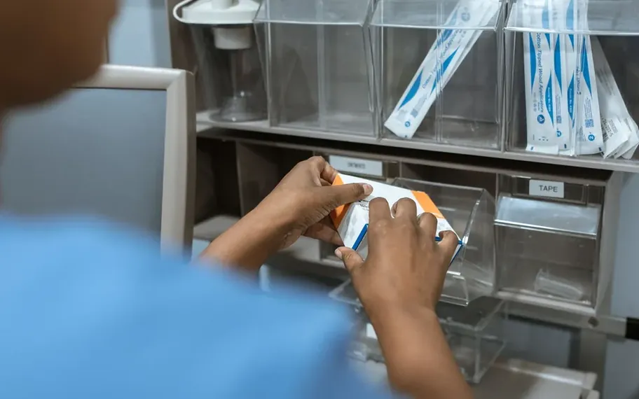 Sentry Medical worker checking supplies.