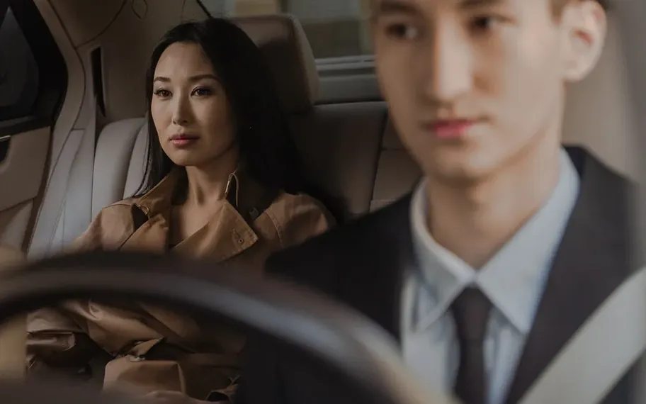 Rideshare passengers in a car.