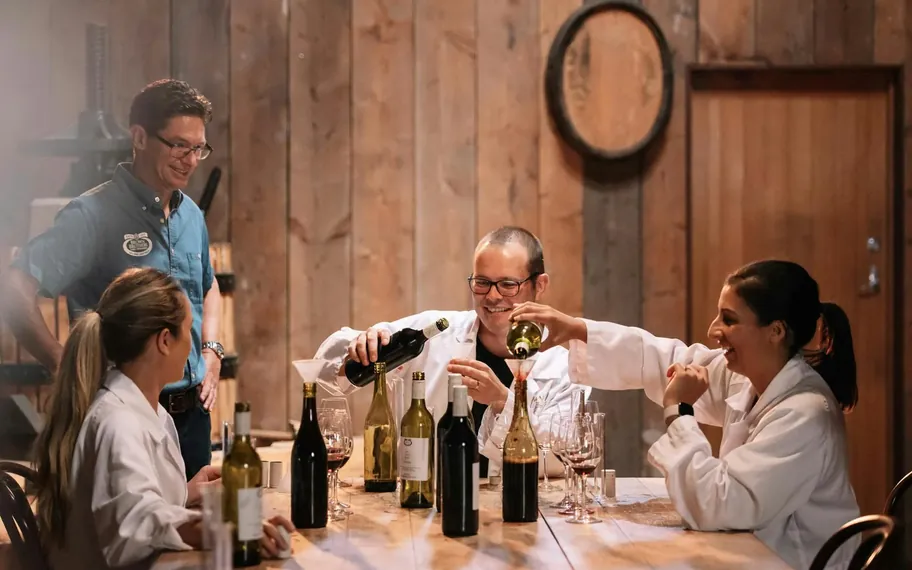 Brown Brothers guests at a wine-blending table.